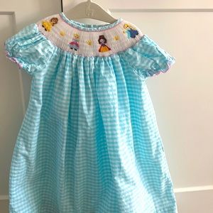 Disney Princess smocked dress. Size 2T (runs big). Worn once.